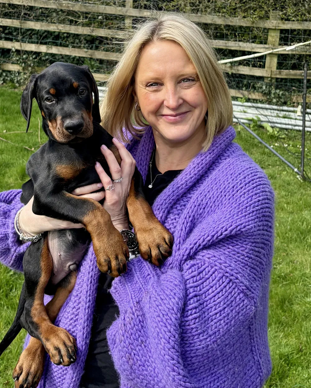 Sarah holding Dennis as a puppy